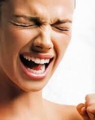 a woman's irritability is a sign of the presence of parasites